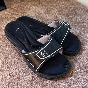 Well worn Nike sandals